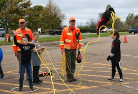 Colchester SAR members taught children about different search and rescue techniques at the open house.