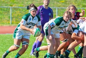UPEI Panthers flanker Brinten Comeau of Hammonds Plains carries the ball during an AUS rugby match against the Acadia Axewomen on Sept. 17 in Charlottetown. - THOMAS BECKER / UPEI ATHLETICS  