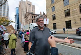 Bill Zebedee, who heads up the Protect Our Southdale Wetland Society, speaks to the media Tuesday afternoon. Approximately 30 people rallied outside Province House trying to bring awareness the need to protect the areas from development. - Eric Wynne / The Chronicle Herald