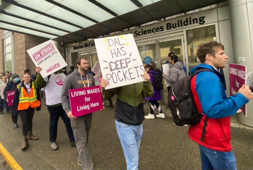 Members of CUPE Local 3912, representing teaching assistants, part-time instructors and other Dalhousie University workers, picket outside the Marion McCain building at the school last month.