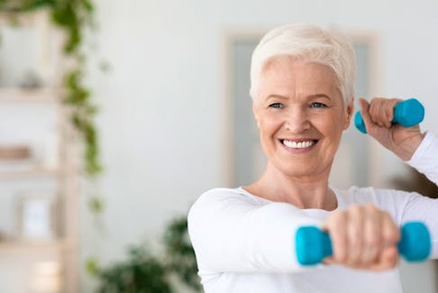 Portrait Of Happy Elderly Woman Exercising With Dumbbells At Home, Having Active Lifestyle On Retirement, Smiling At Camera, Copy Space  Treatment plans for managing osteoarthritis should include appropriate exercise. 123RF