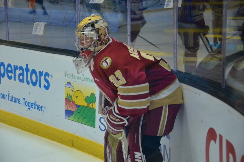 Goaltender Chad Arsenault of St. Raphael follows the action as a member of the Acadie-Bathurst Titan during the warm-up for a Quebec Major Junior Hockey League game against the Charlottetown Islanders at Eastlink Centre last season. The Summerside D. Alex MacDonald Ford Western Capitals acquired Arsenault’s Maritime Junior Hockey League (MHL) playing rights in a trade with the Valley Wildcats on Oct. 18. Jason Simmonds • The Guardian