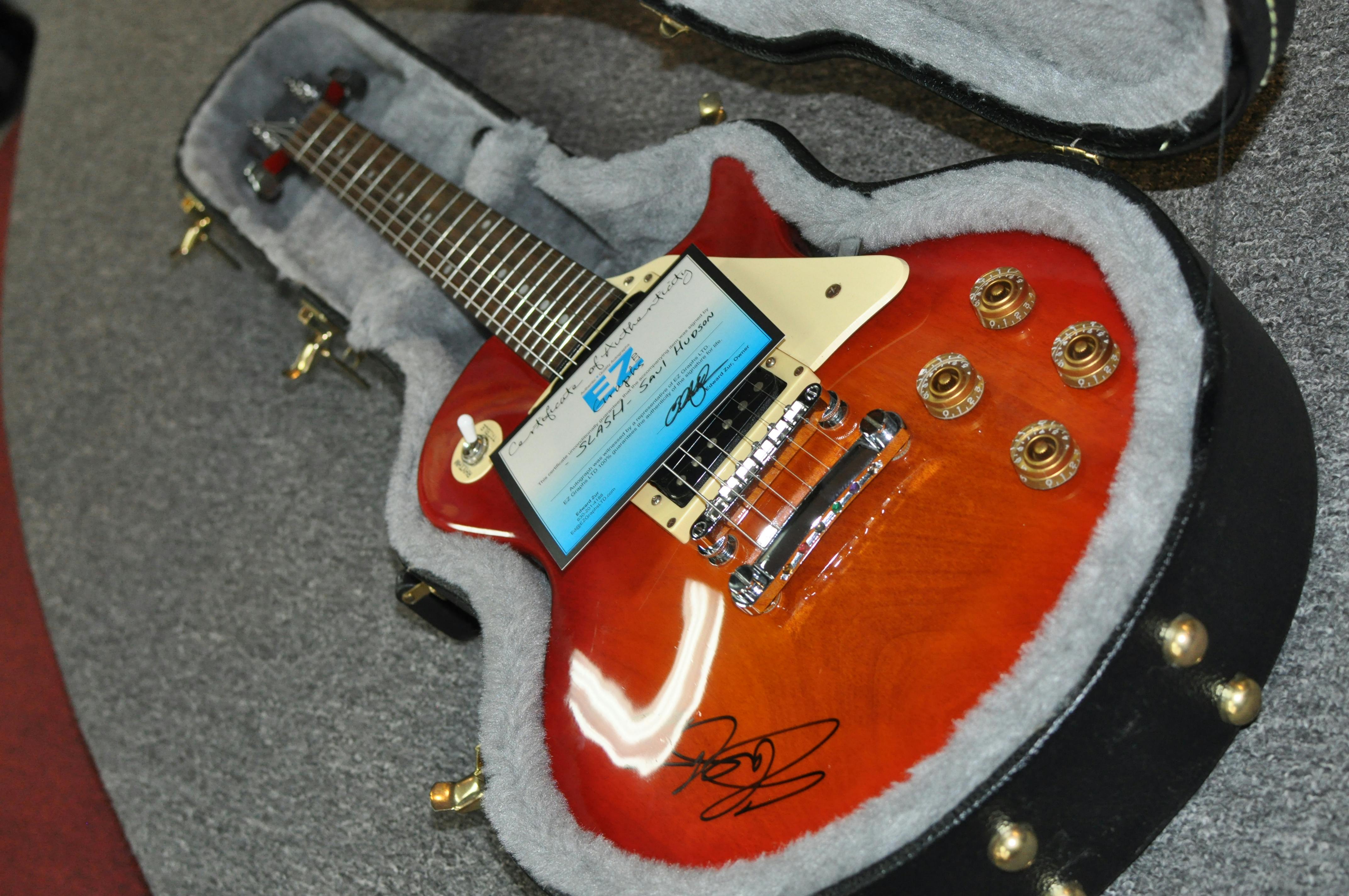 When a C.B.S. man saw a guitar signed by Slash he had to have it