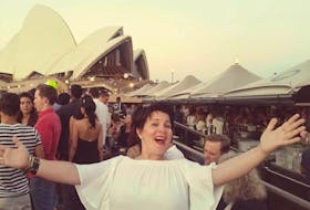 Emilie Chiasson pretends to sing outside the Sydney Opera House. - Contributed