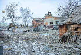Debris is seen next to houses destroyed by shelling, amid Russia's invasion of Ukraine, in Sumy, Ukraine March 8, 2022 in this picture obtained from social media. Andrey Mozgovoy/via REUTERS  THIS IMAGE HAS BEEN SUPPLIED BY A THIRD PARTY. MANDATORY CREDIT.  Debris is seen next to houses destroyed by Russian shelling in Sumy, Ukraine on March 8 in this picture obtained from social media. This is the city where Margo Sobolieva, a refugee now living in St. John’s, NL, had lived before fleeing the war and leaving her family and friends behind. Andrey Mozgovoy/via REUTERS