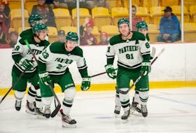 The UPEI Panthers’ Carson MacKinnon, 23, TJ Shea, 81, and Kyle Maksimovich, 9, celebrate after a goal against the Saint Mary’s Huskies in an Atlantic University Sport men’s hockey game at MacLauchlan Arena in Charlottetown on Oct. 21. MacKinnon is from Summerside, and Shea is from Tignish. UPEI defeated Saint Mary’s 9-1 and returns to MacLauchlan Arena to face the Acadia Axemen on Aug. 29 at 7 p.m. Janessa Hogan Photo • Courtesy of UPEI Athletics