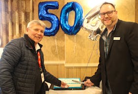 The chamber celebrated reaching over 500 members with over $1,000 in prizes and cake. Pictured is Truro's Mayor Bill Mills and chamber president Matthew Mossman.