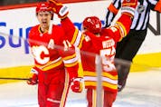 Calgary Flames' Mikael Backlund scores the game winner against Vegas Golden Knights goalie Logan Thompson in the third period of NHL action at the Scotiabank Saddledome in Calgary on Tuesday, October 18, 2022. 