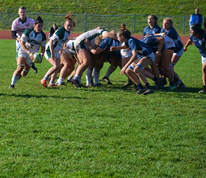 The UPEI Panthers’ Brinten Comeau, 7, of Hammonds Plains, N.S., carries the ball during an Atlantic University Sport (AUS) women’s rugby semifinal game against the St. Francis Xavier X-Women at MacAdam Field on Oct. 20. Comeau was named the AUS most valuable player on Oct. 25. Jason Simmonds • The Guardian