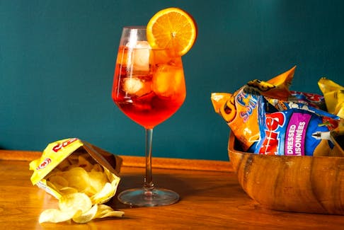 The humble chip — whether potato, Dorito or Cheeto — is a great pairing for cocktails. - Gabby Peyton