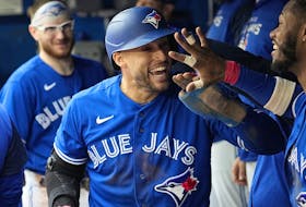 Oct 1, 2022; Toronto, Ontario, CAN; Toronto Blue Jays center fielder George Springer celebrates scoring against the Boston Red Sox during the fifth inning at Rogers Centre.  