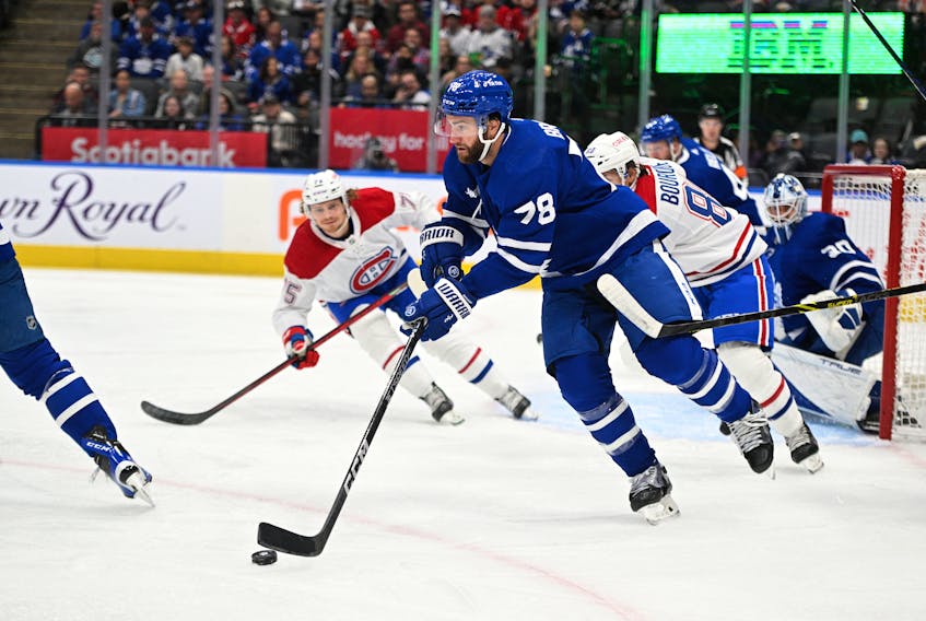 Sep 28, 2022; Toronto, Ontario, CAN; Toronto Maple Leafs defenseman TJ Brodie (78) skates the puck away from his goal area against the Montreal Canadiens in the first period at Scotiabank Arena. Mandatory Credit: Dan Hamilton-USA TODAY Sports  Toronto Maple Leafs defenseman TJ Brodie (78) skates the puck away from his goal area against the Montreal Canadiens in Sept. 28 pre-season action at Scotiabank Arena. - Dan Hamilton-USA TODAY Sports