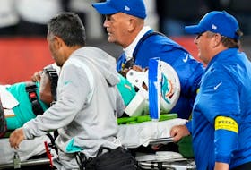 Dolphins quarterback Tua Tagovailoa is taken off the field after suffering a head injury following a sack by Bengals defensive tackle Josh Tupou (not pictured) in the second quarter at Paycor Stadium in Cincinnati, Thursday, Sept. 29, 2022.