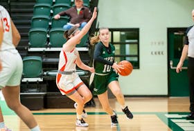 The UPEI Panthers’ Alicia Bowering, 10, drives to the basket as the Cape Breton Capers’ Mackenzee Ryan defends in an Atlantic University Sport women’s basketball game at the Chi-Wan Young Sports Centre in Charlottetown on Oct. 29. Bowering scored a game-hgih 19 points to lead the Panthers to an 80-58 win. Janessa Hogan Photo • Courtesy of UPEI Athletics