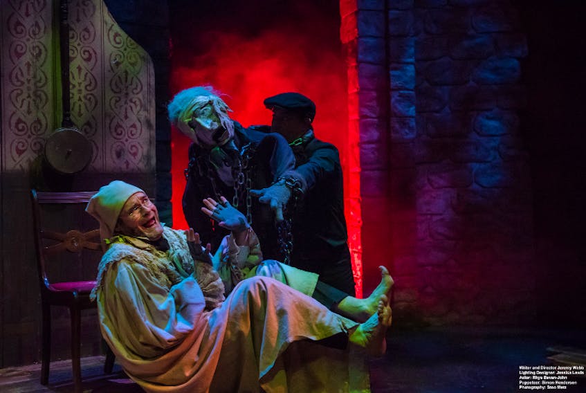 Rhys Bevan-John plays Ebenezer Scrooge and Simon Henderson manages three unique ghostly puppets in this classic retelling of ‘Dickens’ A Christmas Carol.’ PHOTO CREDIT: Contributed/ Stoo Metz.