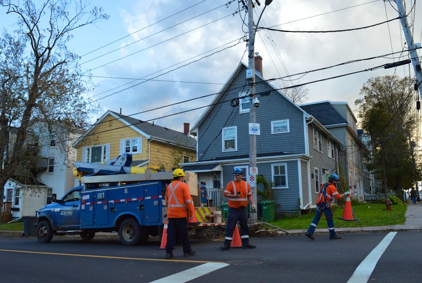 A Maritime Electric crew prepares to energize a section of Kent Street on Sept 28. Maritimes Electric CEO Jason Roberts told a standing committee on Oct. 31 hat the utility needs to improve its communication of power outages and restoration timelines in the future. Alison Jenkins • The Guardian