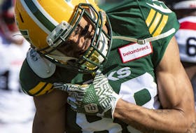 Edmonton Elks slotback Kenny Lawler (89) is injured after making a catch against the Montreal Alouttes at Commonwealth stadium in Edmonton on Saturday, Oct. 1, 2022.