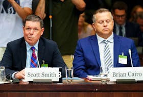 Scott Smith, Hockey Canada president and chief operating officer, left, and Hockey Canada chief financial officer Brian Cairo testify before the standing committee on Canadian Heritage, in Ottawa on July 27.