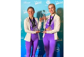 Janelle Banks, left, and Molly MacEwen hold an award they earned in July at the Dance World Cup Canada competition. - Michelle Banks/Special to SaltWire Network