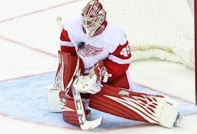 Goaltender Magnus Hellberg (45) makes a save while playing for Detroit Red Wings in 2022.