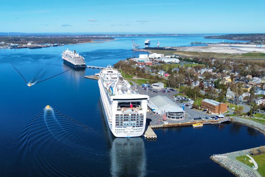 Sydney harbour was busy on Wednesday with visits from three cruise ships. This aerial photograph shows the Caribbean Princess in the foreground berthed at the main dock beside the Big Fiddle and Joan Harriss Cruise Pavilion. The ship on the left is the Borealis, docked at the Liberty Pier, while the Nieuw Statendam sits at anchor further out in the harbour. The small yellow boats, called tenders, are busy ferrying passengers to and from the at-anchor ship. DAVID JALA/CAPE BRETON POST