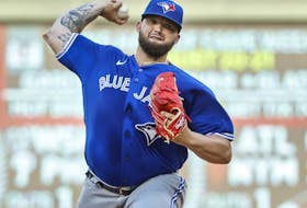 Blue Jays starting pitcher Alek Manoah throws to the Minnesota Twins in the first inning of a baseball game on Thursday. 
