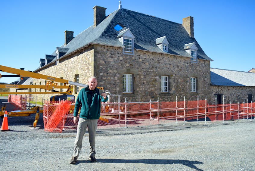 Eddie Kennedy, the manager of visitor experience at the Fortress of Louisbourg National Historic Site, holds a part of a slate shingle torn off the Engineer’s Building. The fortress remains closed to the public until Oct. 10 as crews work to repair the damage caused by post-tropical storm Fiona. Chris Connors/Cape Breton Post