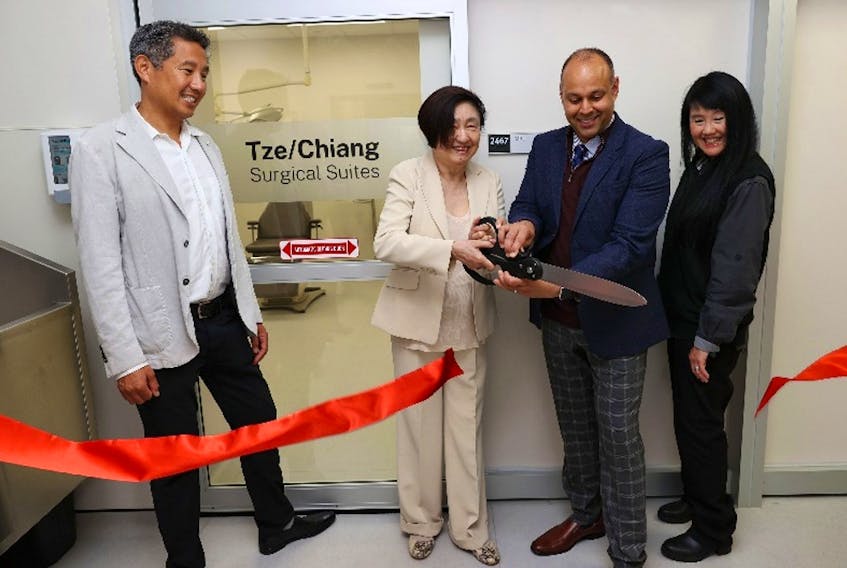 Dr. Theresa Chiang cuts the ribbon for the Tze / Chiang Paediatric and Adult Special Needs Clinic at the Dalhousie faculty of dentistry. The clinic was made possible by Dr. Chiang’s $1-million gift to the faculty. Chiang was accompanied by her children Dennis Tze, left and Deirdra Tze, right, and Dr. Sachin Seth, associate dean of academics, faculty of Dentistry. Contributed