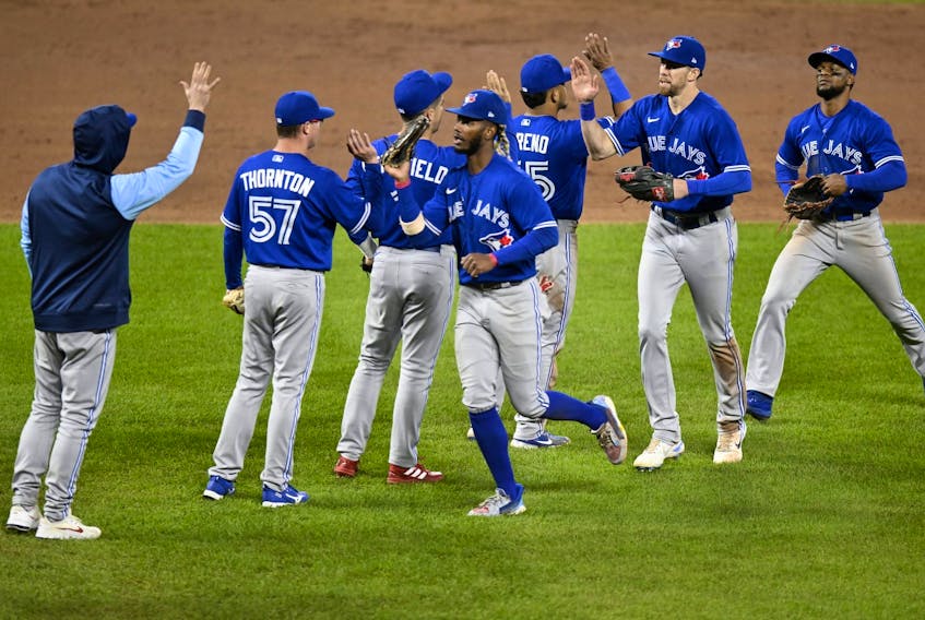 The Toronto Blue Jays celebrate after a 5-1 victory against the Baltimore Orioles during game two of a doubleheader at Oriole Park at Camden Yards on October 05, 2022 in Baltimore, Maryland.  