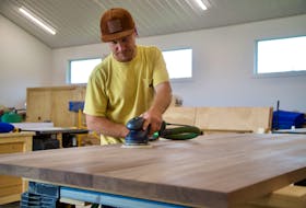 Brodye Chappell, owner of Brodye Chappell Builds, says he's excited to be able to turn Charlottetown's fallen trees into furniture and unique wood pieces that will last long beyond his lifetime, instead of the trees being destroyed and turned into mulch. Cody McEachern • The Guardian