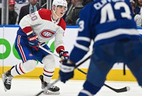 Sep 28, 2022; Toronto, Ontario, CAN; Montreal Canadiens forward Juraj Slafkovsky (20) skates with the puck against the Toronto Maple Leafs in the third period at Scotiabank Arena.  