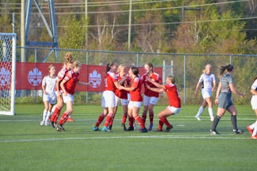 P.E.I. FC celebrate the team’s first goal against Alberta at the 2022 Toyota national championship U15 Cup at the UPEI turf field on Oct. 5. The P.E.I. FC girls opened play with a 3-0 win over Alberta. Jason Simmonds • The Guardian