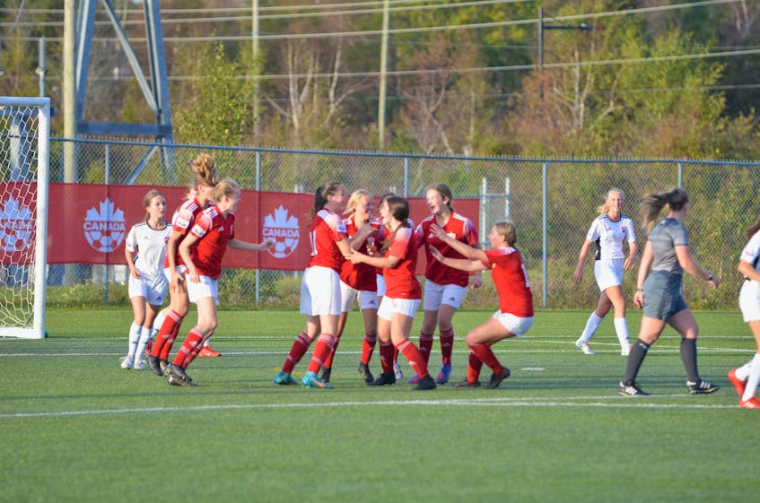 P.E.I. FC celebrate the team’s first goal against Alberta at the 2022 Toyota national championship U15 Cup at the UPEI turf field on Oct. 5. The P.E.I. FC girls opened play with a 3-0 win over Alberta. Jason Simmonds • The Guardian