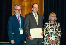 Étienne Côté, middle, a faculty member at the Atlantic Veterinary College, has been elected to the Canadian Academy of Health Sciences.