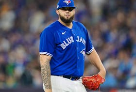 Toronto Blue Jays starting pitcher Alek Manoah walks to the dugout after being pulled in the sixth inning against the Seattle Mariners during Game 1 of the wild-card series for the 2022 MLB Playoffs at Rogers Centre, Oct. 7, 2022.