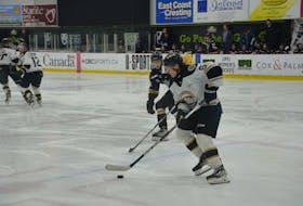 Charlottetown Islanders defenceman Isaac Vos carries the puck against the cape Breton Eagles in a Quebec Major Junior Hockey League pre-season game at MacLauchlan Arena in Charlottetown on Sept. 9. The Islanders’ home opener at Eastlink Centre is Oct. 8 against the Halifax Mooseheads at 7 p.m. Jason Simmonds • The Guardian