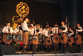 The Grades 3 and 5 students comprising the Cape Breton University Pipe Band perform on Saturday at the Gaelic College in St. Anns. IAN NATHANSON/CAPE BRETON POST
