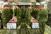  Members of the Princess Patricia’s Canadian Light Infantry pay their last respects aboard a United States Air Force C 17 aircraft to four of their fallen comrades who were killed in a training accident near Kandahar, Afghanistan in April 2002.