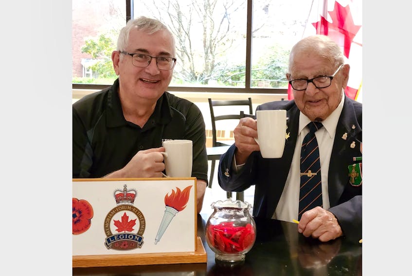 James Matheson, president of the Royal Canadian Legion in Antigonish, left, shares some memories with Willie Westenenk. Willie, 93, served with the Dutch Army while James is a military veteran. CONTRIBUTED
