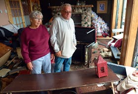 The seaside facing side of Ricky and Patty Munden's house in Port Aux Basques was slammed with waves and boulders the day hurricane Fiona struck. Here they look over the destruction in their lower level living room.


Keith Gosse/The Telegram