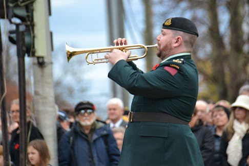 Capt. Rory O’Donnell, director of music for the P.E.I. Regimental Band and bugler for the Remembrance Day ceremony, plays The Last Post on Nov. 11 at Charlottetown’s 2022 Remembrance Day service. Held in front of the cenotaph in the city’s downtown, the service drew hundreds of people. A military parade opened the event, proceeding from the Charlottetown Legion and featuring different branches of the Canadian Armed Forces. This year was the first time since 2019 the ceremony was open to the public after being restricted because of COVID-19. The ceremony featured the traditional two minutes of silence, playing of The Last Post, laying of wreaths and a short tribute to Flight Sgt. Sterling Banks of the RAF’s No. 3 Squadron, a pilot from P.E.I. who was killed in 1942 during the raid on Dieppe. Logan MacLean • The Guardian