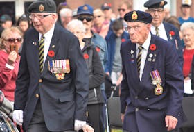 Veterans Bob Baxter (left) and Lloyd Coady took part in the wreath-laying ceremony as part of the Remembrance Day event in Truro. Richard MacKenzie
