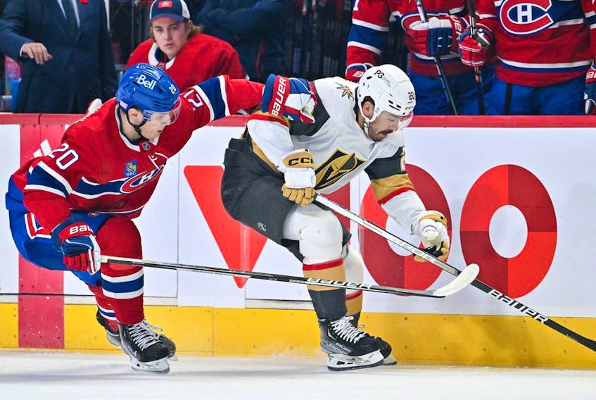 Juraj Slafkovsky of the Montreal Canadiens battles for puck with Chandler Stephenson of the Vegas Golden Knights during the first period at the Bell Centre in Montreal on Nov. 5, 2022.