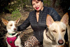 Carmen Perry, centre, of Charlottetown is pictured with her two dogs, Emma, left, and Dallas. Perry was walking the dogs on the Wright’s Creek trail system in the East Royalty neighbourhood on Nov. 2 when Emma was caught in an animal trap and killed. Contributed