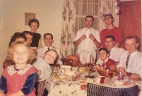 Rosemary Wall shares a picture taken in 1959 of a family Christmas dinner. Her uncle was so determined to attend the family's holiday celebration he arrived in a storm via a curious method of transportation. - Contributed