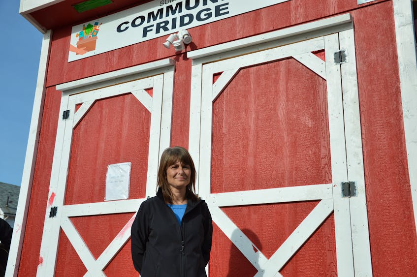 Following months of hard work to spearhead the project, Johlene Clow celebrated the grand opening of the Summerside community fridge on Saturday, Nov. 5. She said she was thrilled to see the community support for the initiative. Kyle Reid
