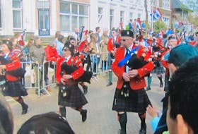 Colchester Legion Pipes And Drums parade at Wageningen, Netherlands in 2015. From left: Piper Maj. Cindy Johnson, Piper Kelly Putnam and Piper Terry White.  Contributed