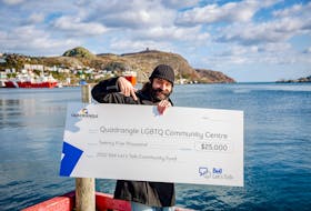 Quadrangle executive director Charlie Murphy with a $25,000 grant from the Bell Let’s Talk Community Fund. The grant will go towards a free online counselling program for members of the 2SLGBTQIA+ community in Newfoundland and Labrador. Contributed