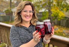 Erin Sulley shows off the final product of her delicious and easy pickled beet recipe that’s most definitely fit to eat. – Paul Pickett