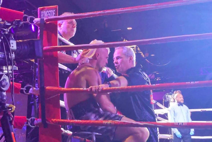 Aaron Kinch coaches Johnny Mac during his debut pro fight in Halifax.